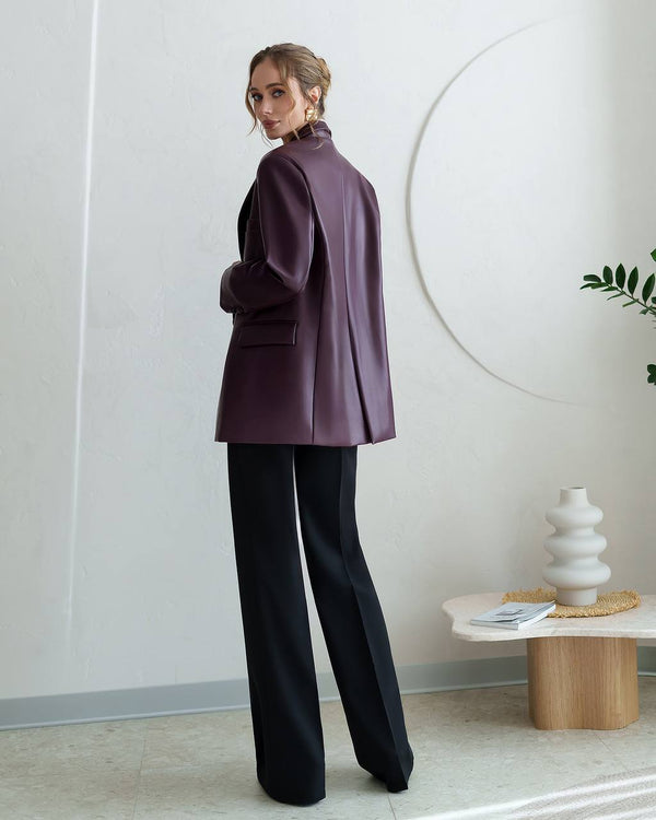 Model in burgundy Morena Pants with coordinating cardigan displaying styling