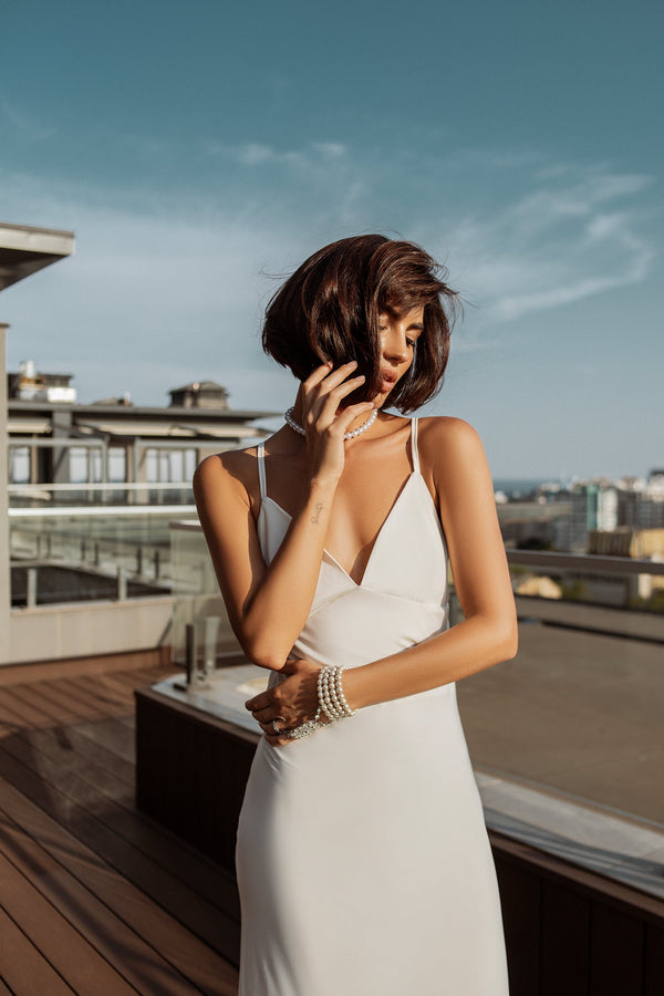 Arvessa Dress in white, full-length back view