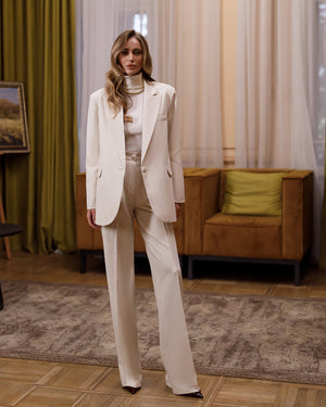 Opulence Suit in sky blue, full-length back view indoors