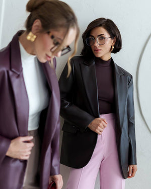 Two models in coordinating Morena Pants and blazer looks together