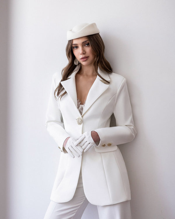 Almira Suit in white, detail of jacket and trouser fit