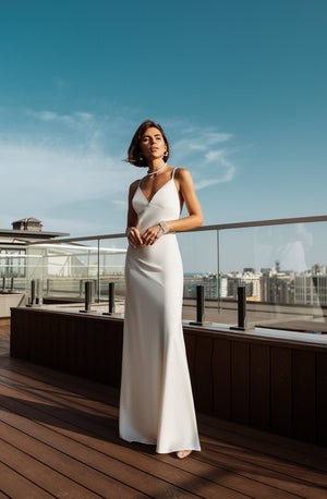 Arvessa Dress in white, side profile showing flow