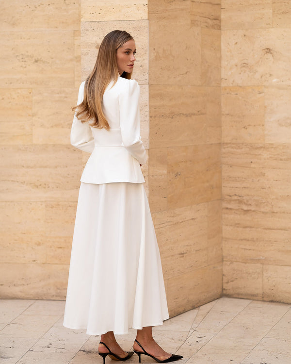 Anselia Suit in white, back view showing A-line drape