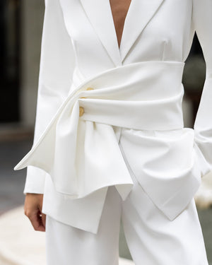Astera Suit white, close-up detail of oversized bow and waist