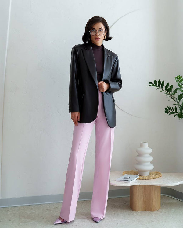 Model in black Morena Pants displaying refined business styling