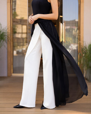 Ceora Top in white, back view on elegant venue