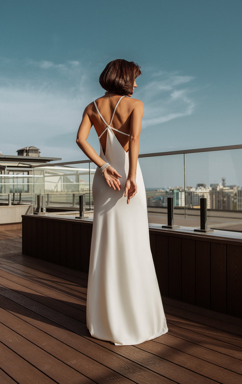 Arvessa Dress in sky blue, back view of open back