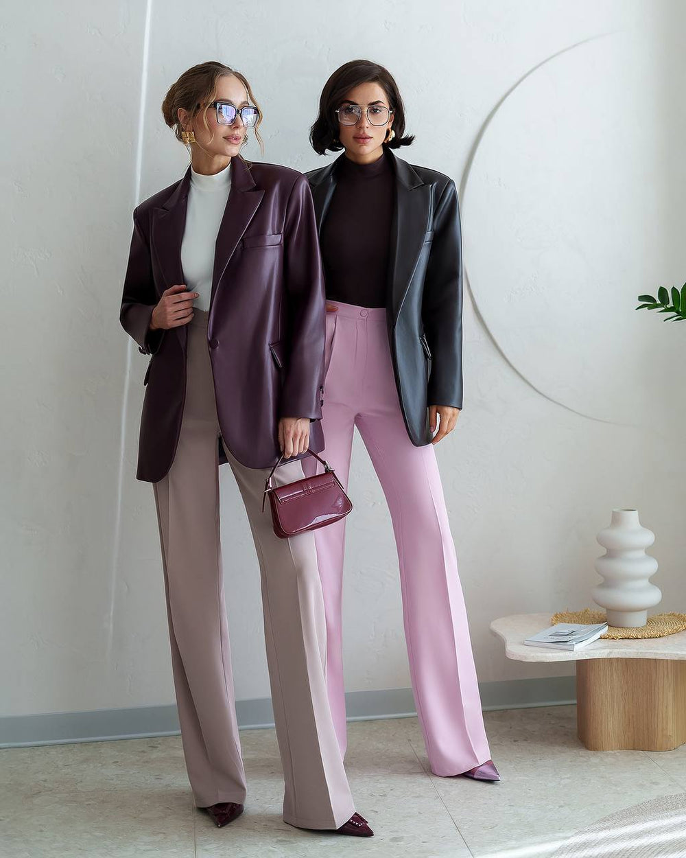 Two models in Morena Pants with coordinating blazers showing versatility