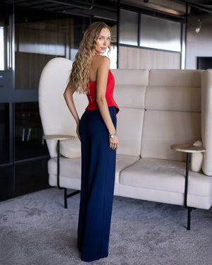 Callistra Vest in red, close-up of deep V and tie detail