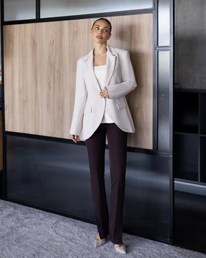 White Lerida Top paired with tailored trousers