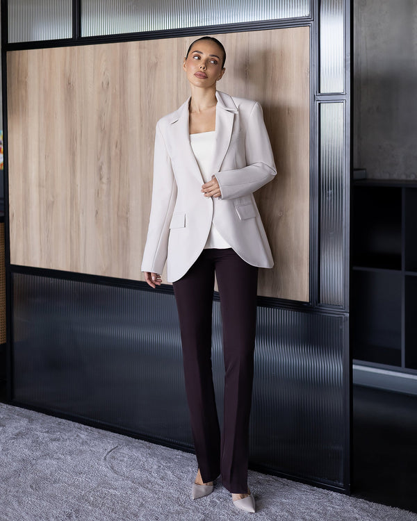 White Lerida Top paired with tailored trousers