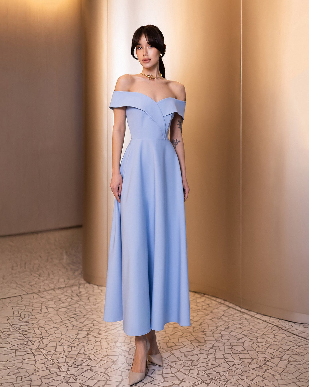 Calyra Dress in sky blue, back view showing full skirt