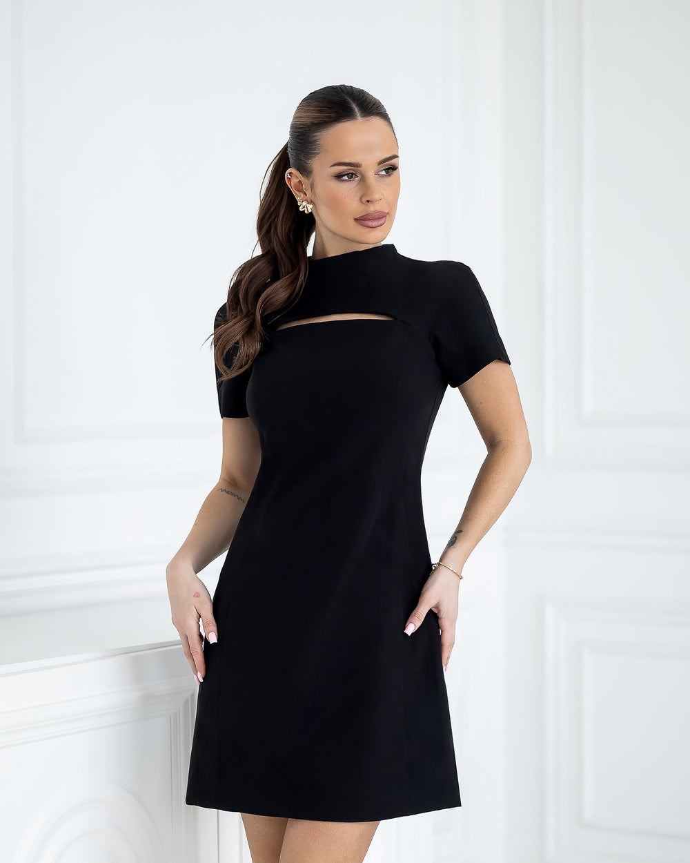 Model in red Norexa dress showing refined fit