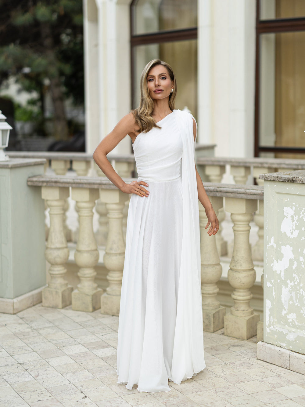 Velanora Bridal white side profile flowing