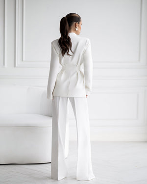 Model in black Montrel suit showing back view of structured silhouette