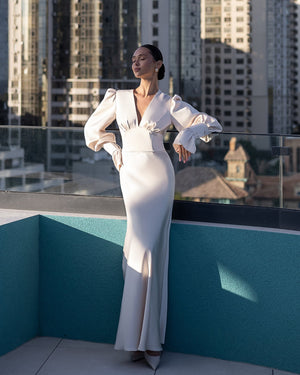 Elviana Dress in light chocolate, seated pose, evening