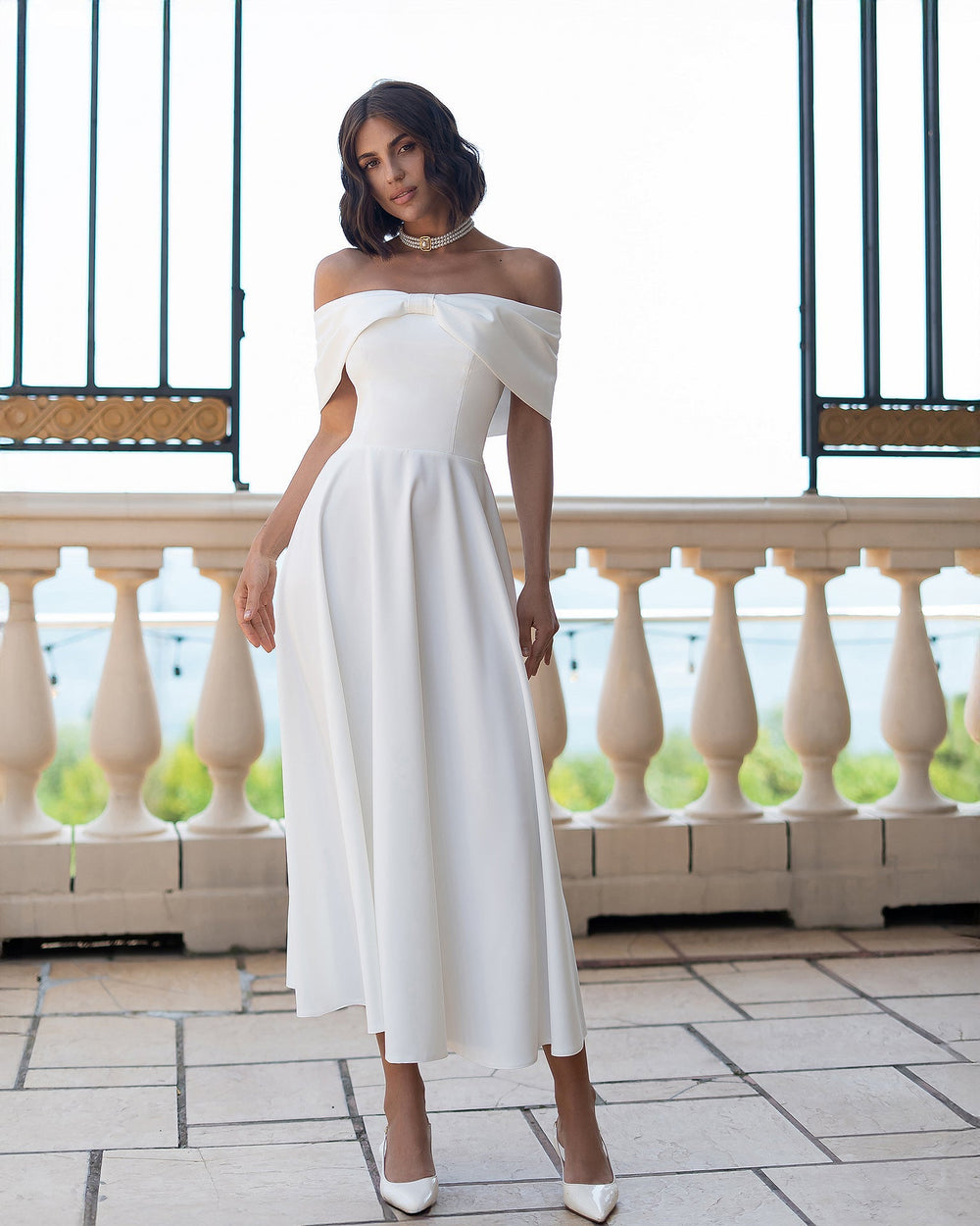 Amour Dress in white, back view of midi length dress