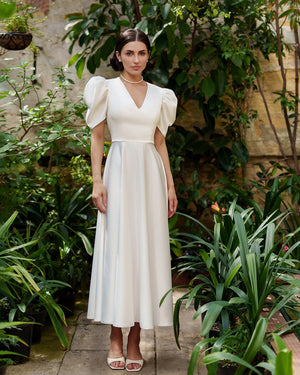 Arabella Dress in white, front view with puffed sleeves