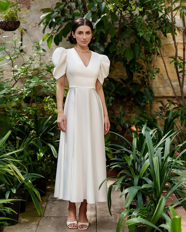 Arabella Dress in white, front view with puffed sleeves
