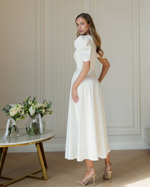 Arabella Dress in cream ivory, back view showing drape