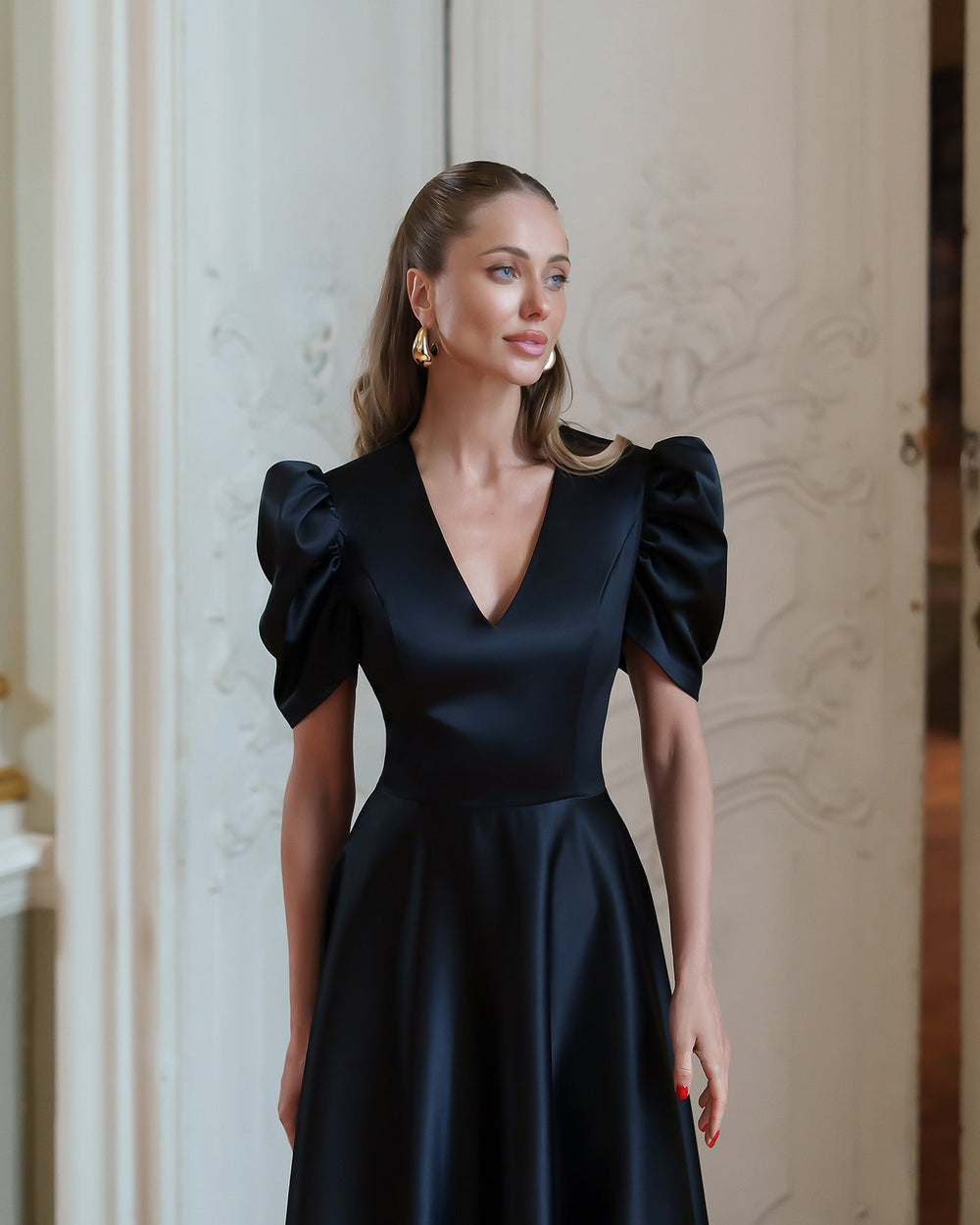 Arabella Dress in black, back view of puff shoulders