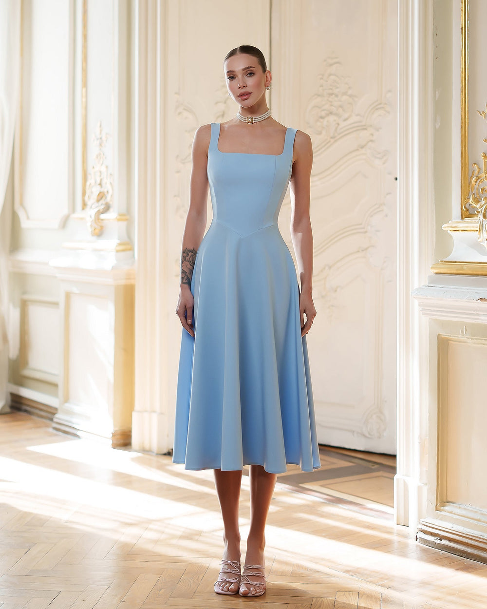 Armani Dress in light blue, back view of design
