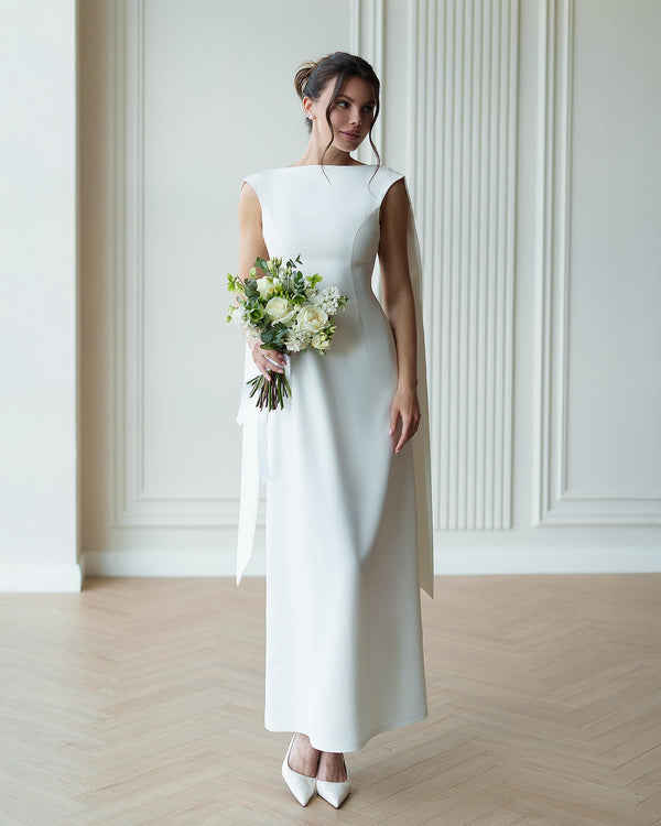 Athena Cape Gown white, full-length showing sleek tailoring