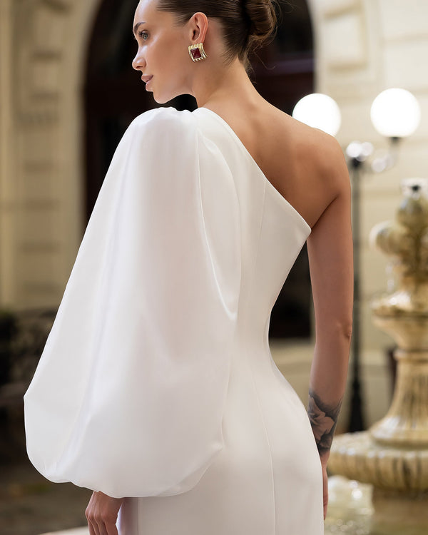 Calista Gown in sky blue, back angle of asymmetric neckline