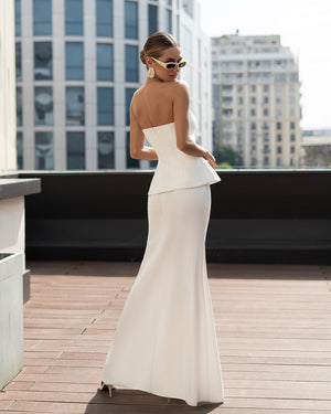 Celestia Bridal Bandeau Suit, back view of model in white maxi silhouette