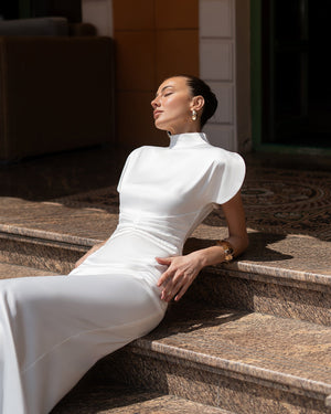 Elysia High-Neck Gown in white, back angle, mermaid