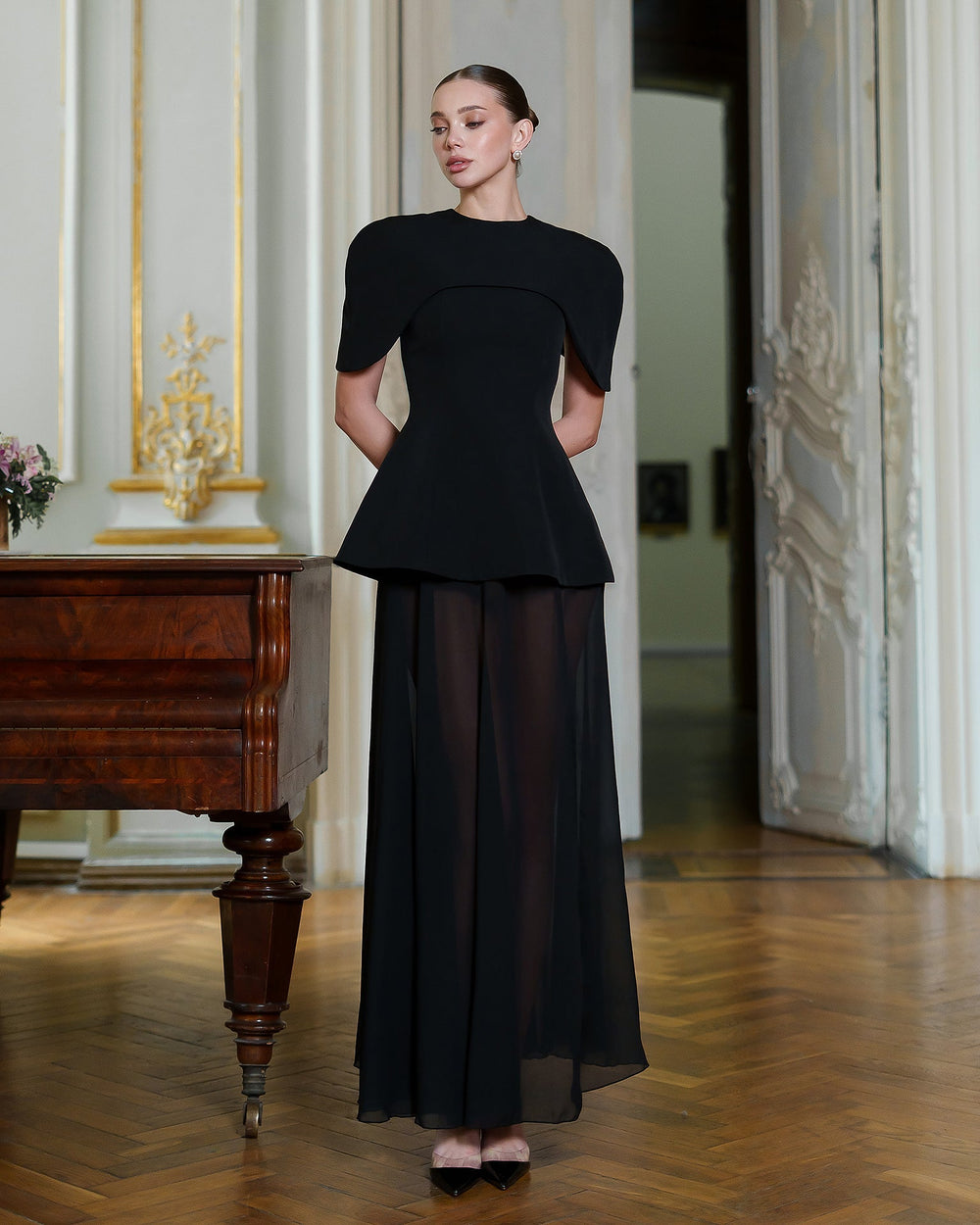 Enigma Dress in black, front view with sculpted corset