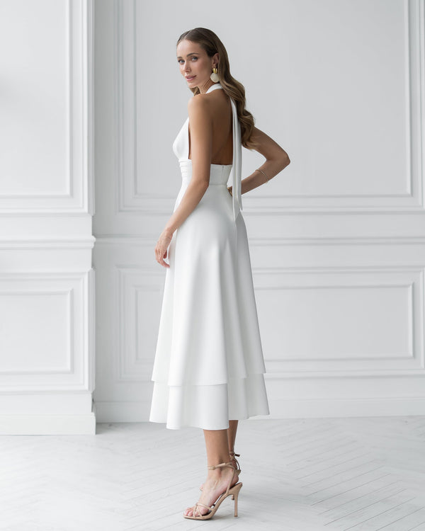 Merida Dress white, front view at formal venue entrance