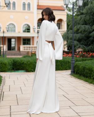 Model wearing Noir set displaying wrap-front crop detail