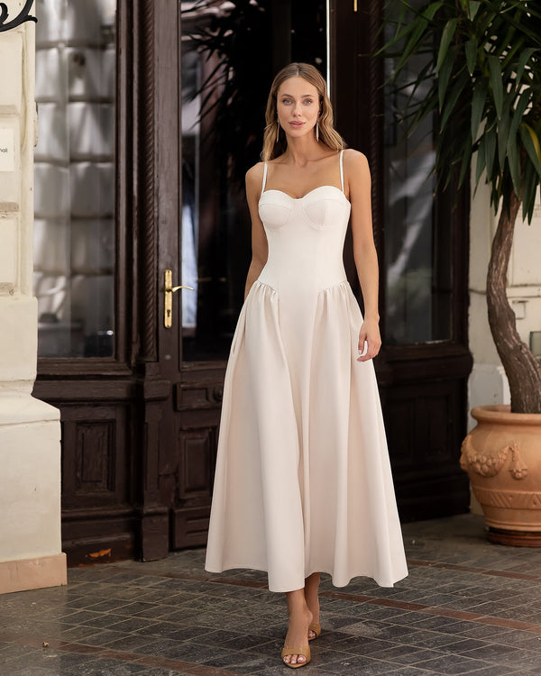 Odette Midi Dress in white, close-up of sleeve and shoulder detail