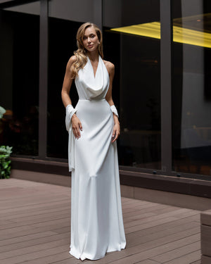 Odile Gown in pink, full-length outdoor view with fountain