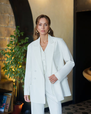 Regent Suit in pink, outdoor standing view