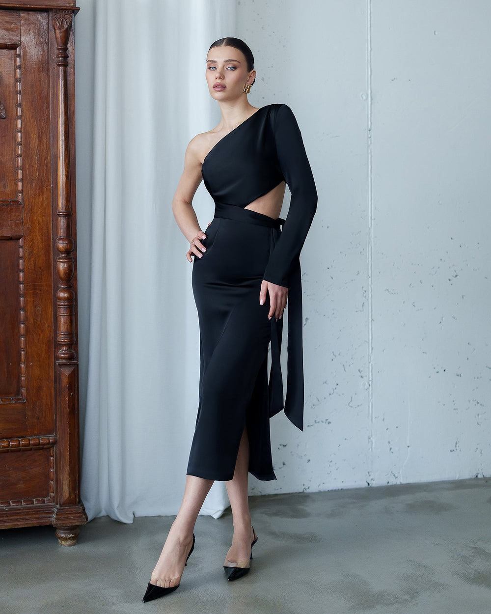Solara Dress in black, indoor venue styling